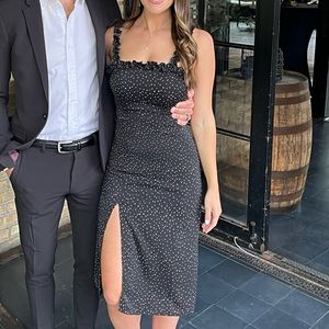 Black polka dot midi dress